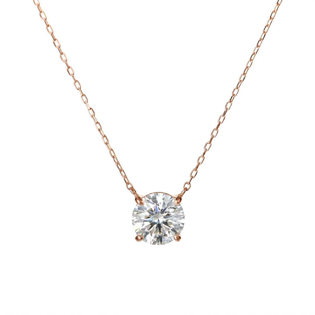 Rose gold necklace with a diamond pendant on a white background