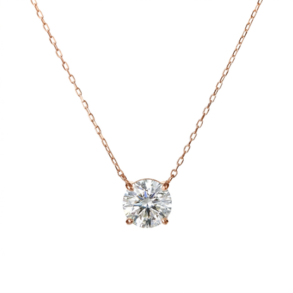 Rose gold necklace with a diamond pendant on a white background
